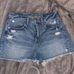 high waisted light blue frayed mom shorts